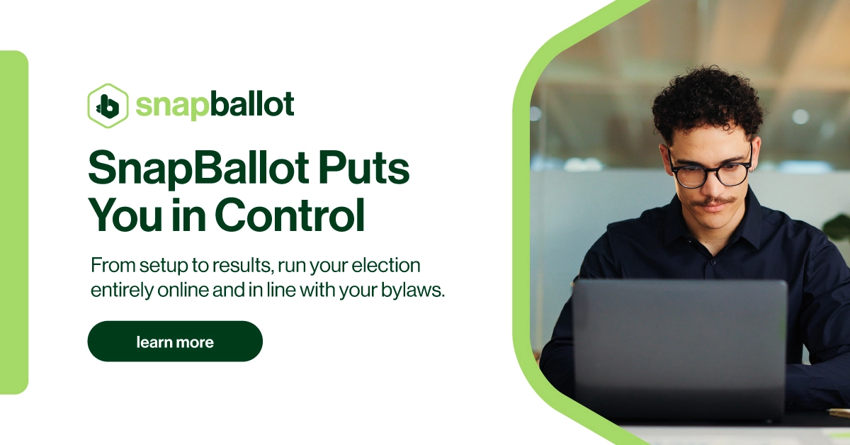 A man with curly hair and glasses works on a laptop. Next to him, text reads: SnapBallot Puts You in Control. From setup to results, run your election entirely online and in line with your bylaws. A green learn more button is below.